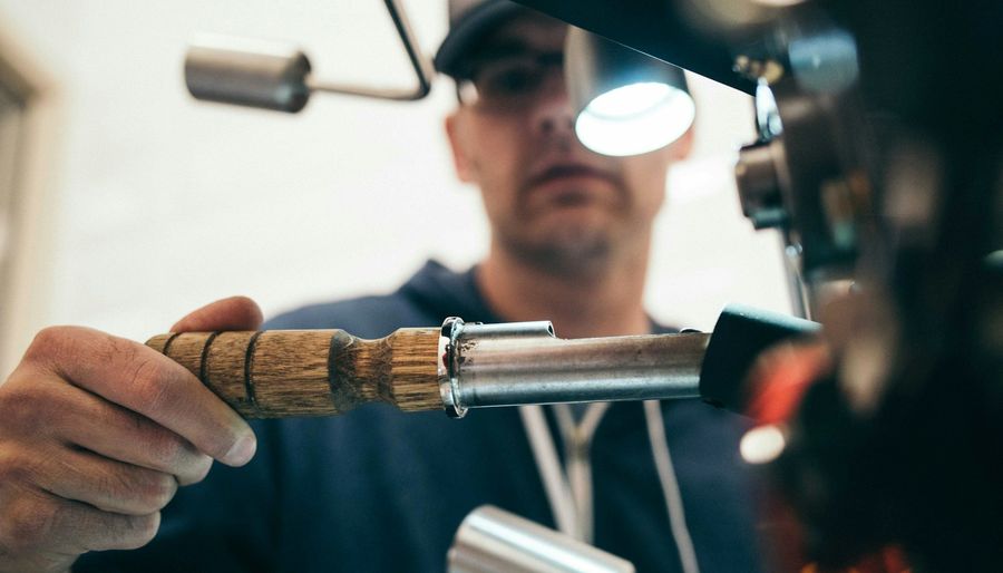 Professional plumber using efficiency tools for home plumbing maintenance
