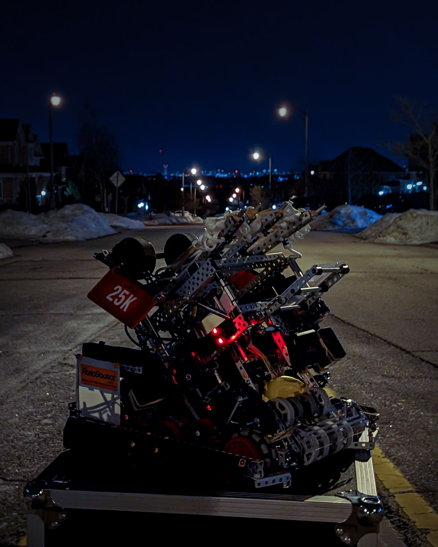 Team 25K robot illuminated at night