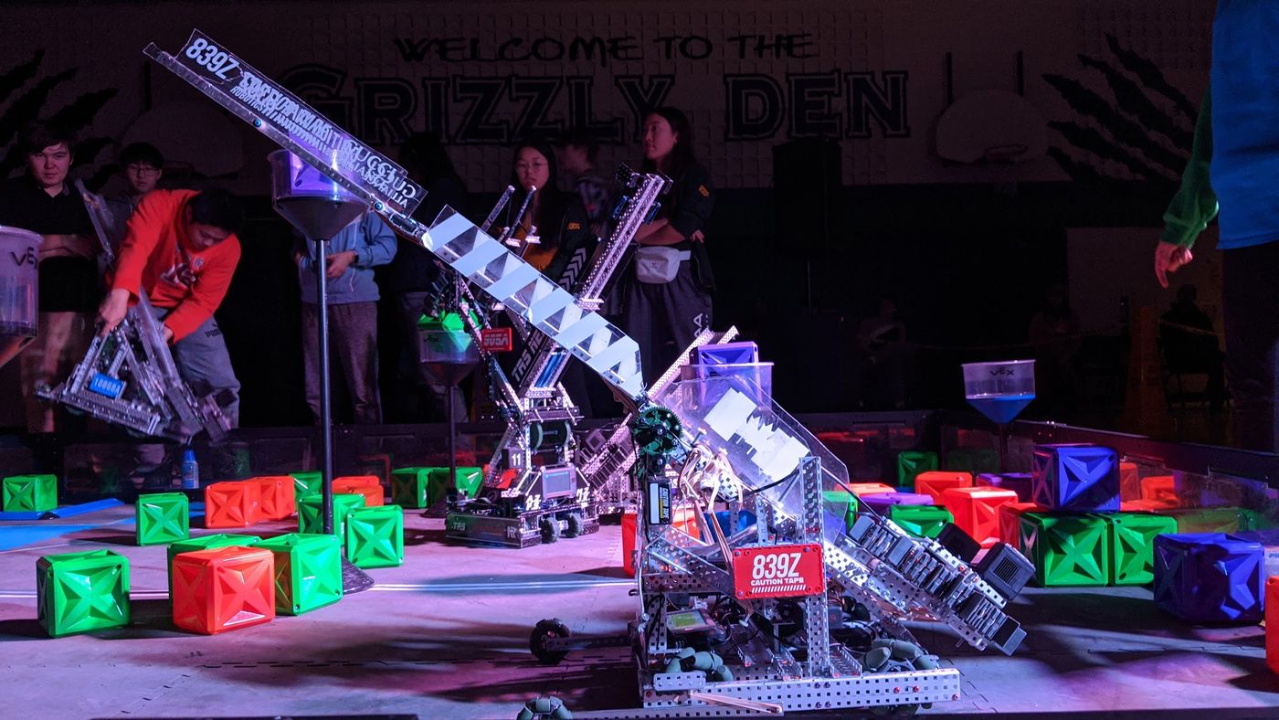 Team 839Z robot on a competition field filled with coloured cubes