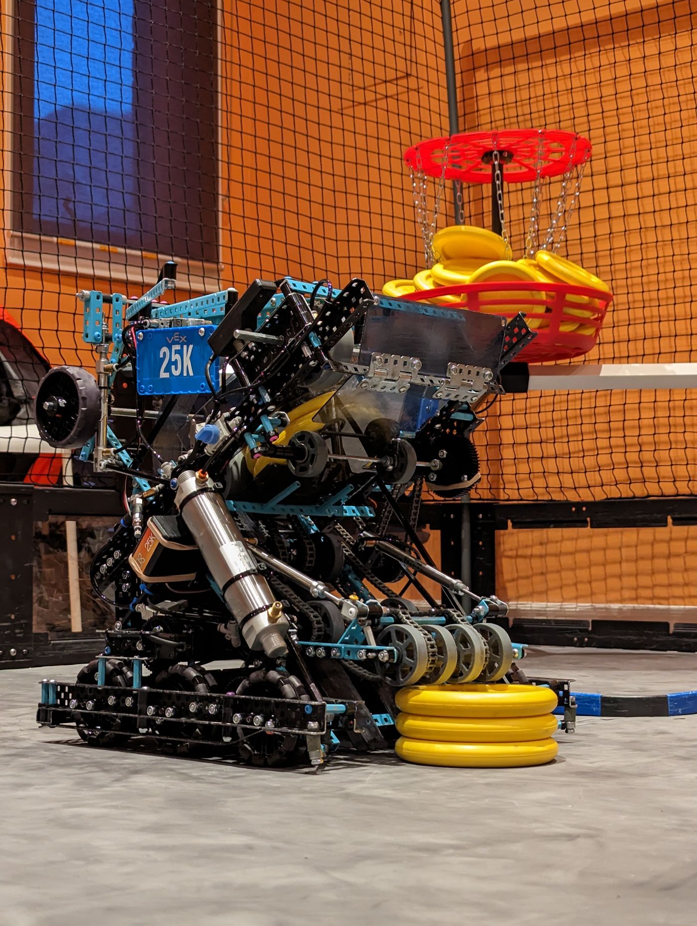 Team 25K robot with discs and a red game goal
