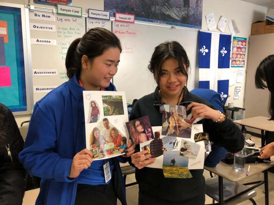 Two educators holding up photo collages