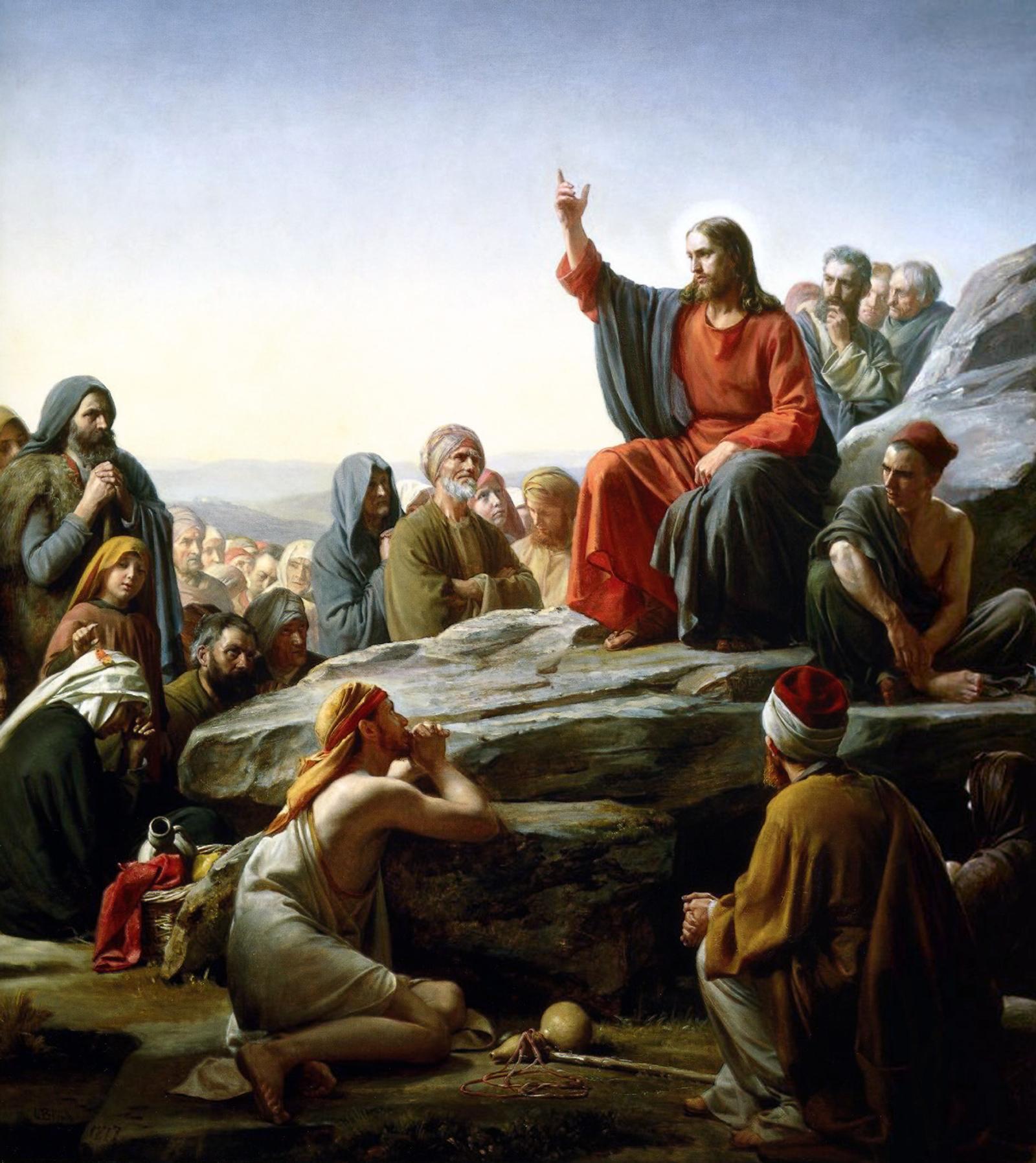 O Sermão da Montanha, de Carl Bloch: Jesus sentado na rocha ensina a multidão reunida.