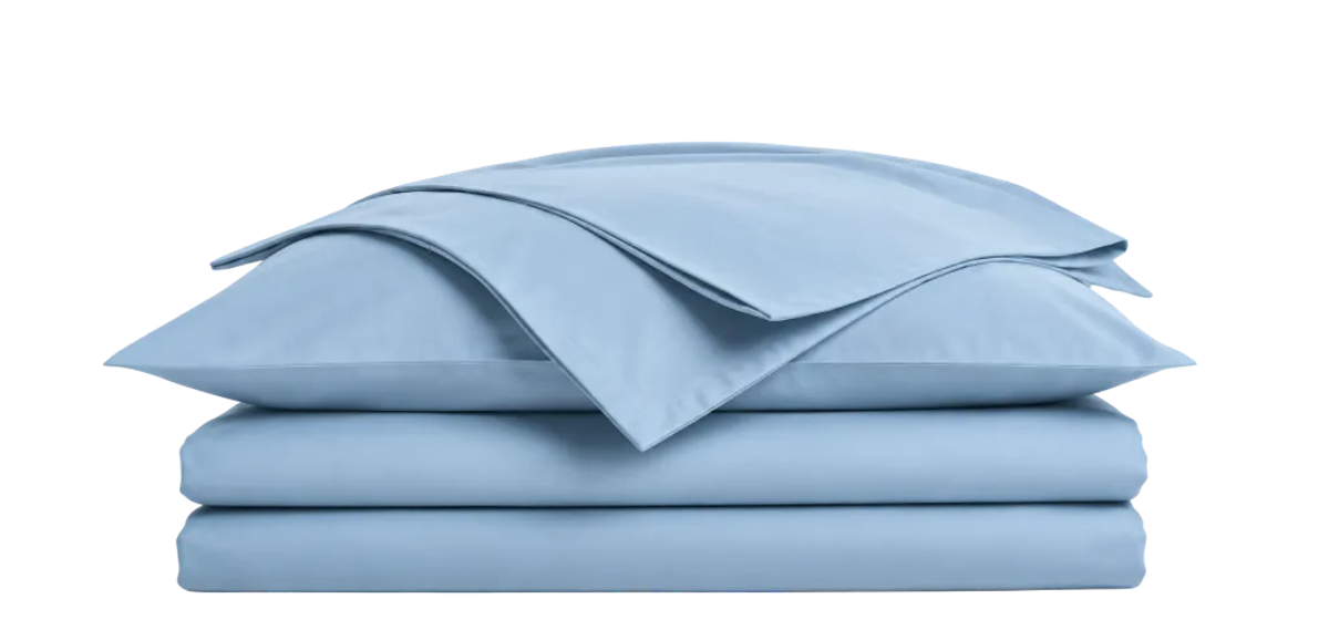 A stack of folded bed linen