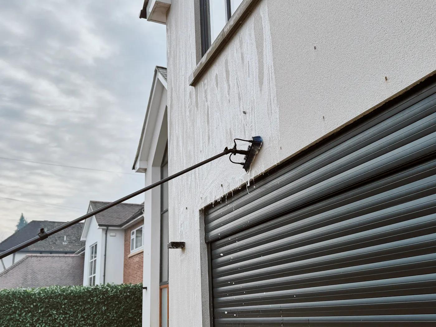 A Willow Alexander team soft washing render on a house, 3