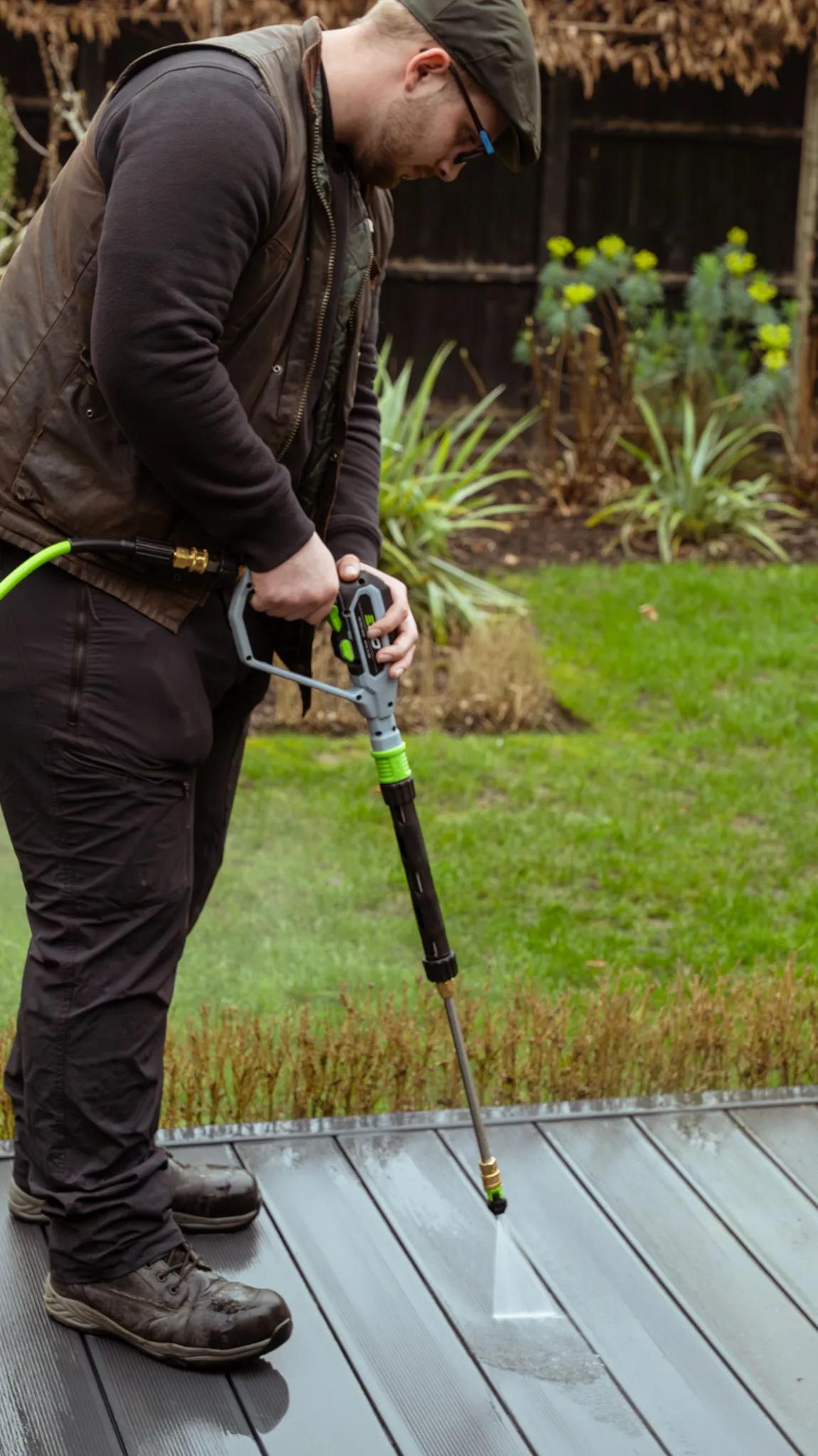 A Willow Alexander team jet washing a driveway, 2