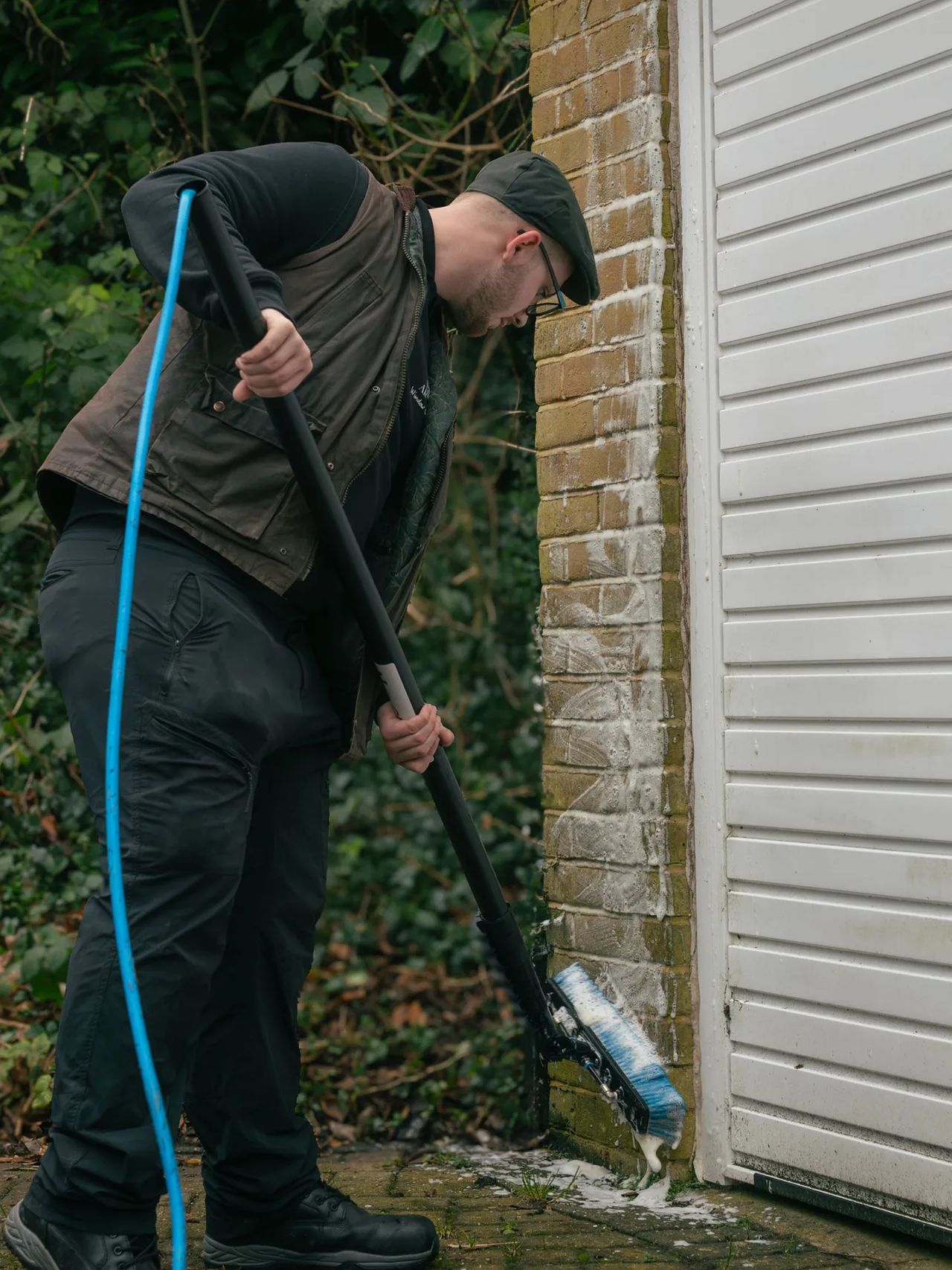 A Willow Alexander team soft washing render on a house, 1