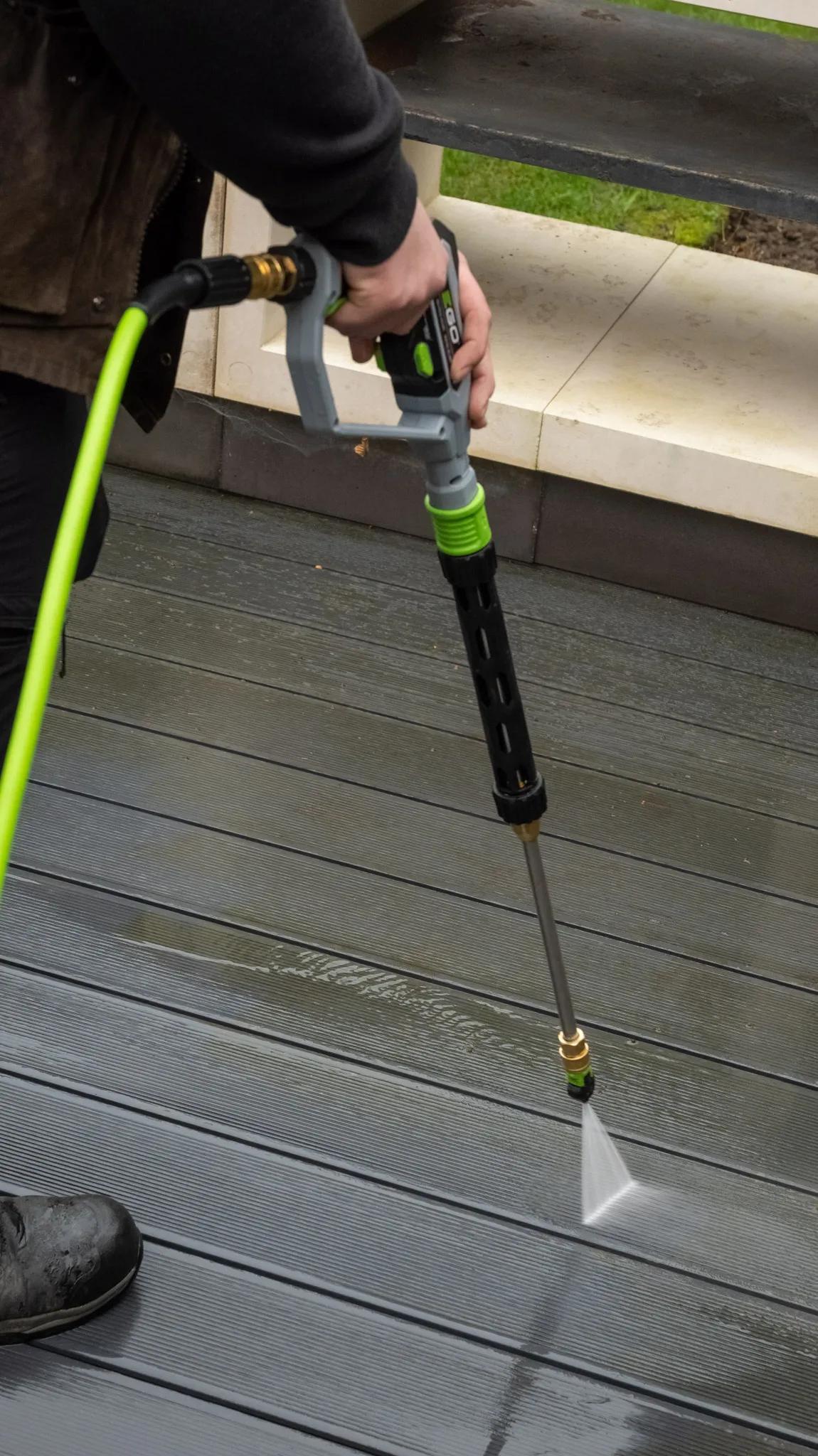 A Willow Alexander team jet washing a driveway, 1