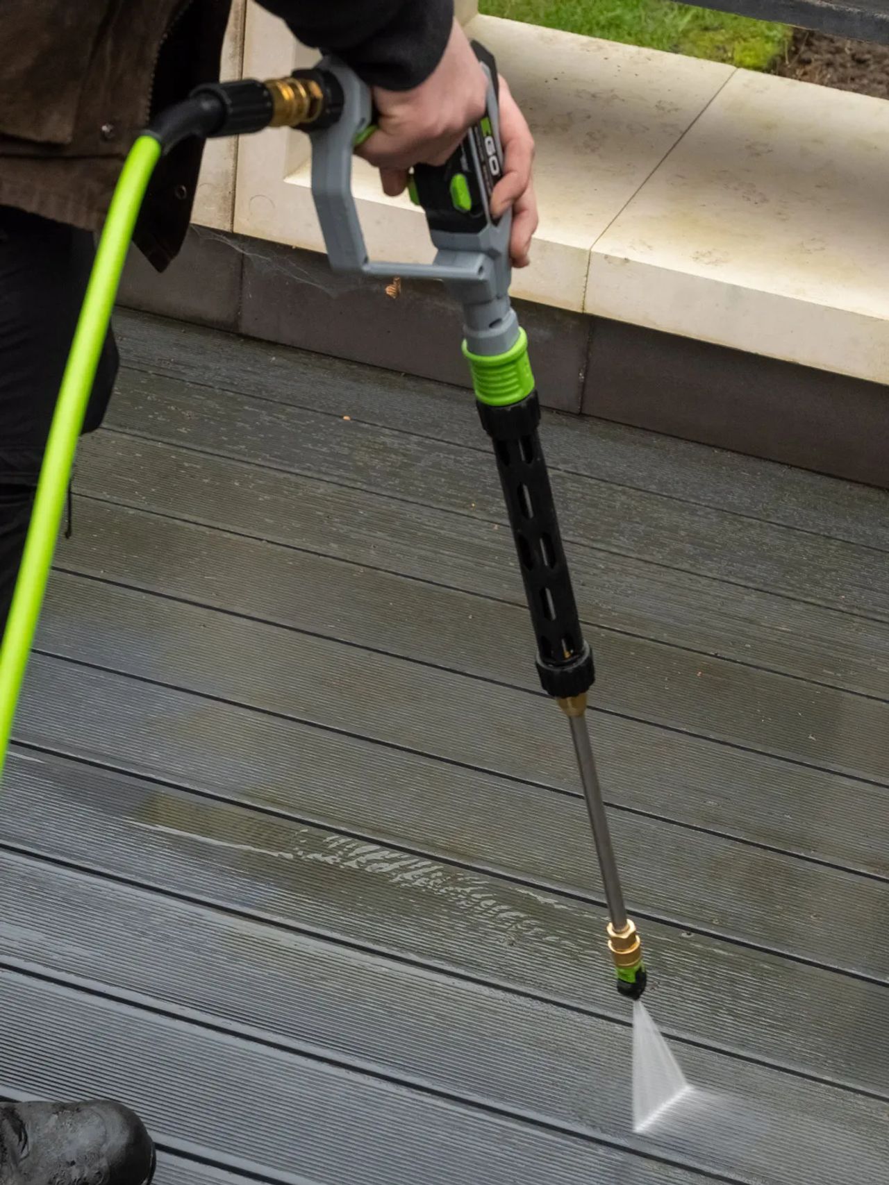 A Willow Alexander team jet washing a driveway, 1