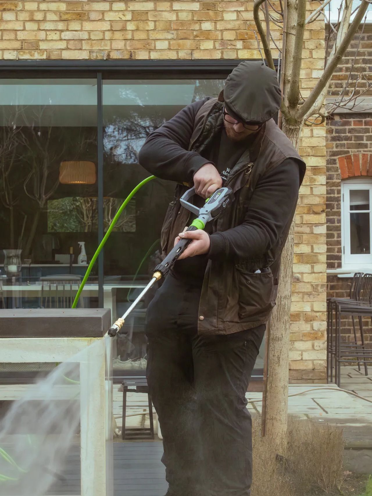 A Willow Alexander team jet washing a driveway, 3