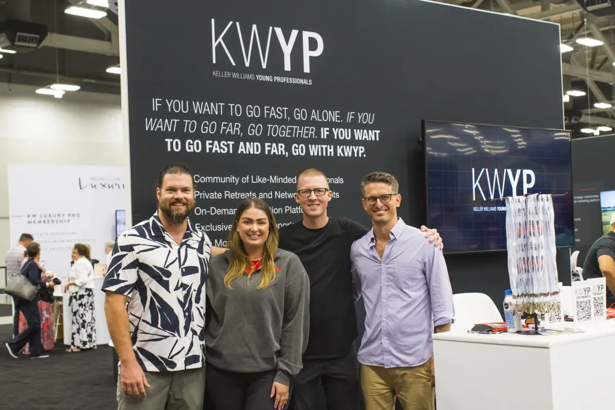 KWYP booth takes a group photo