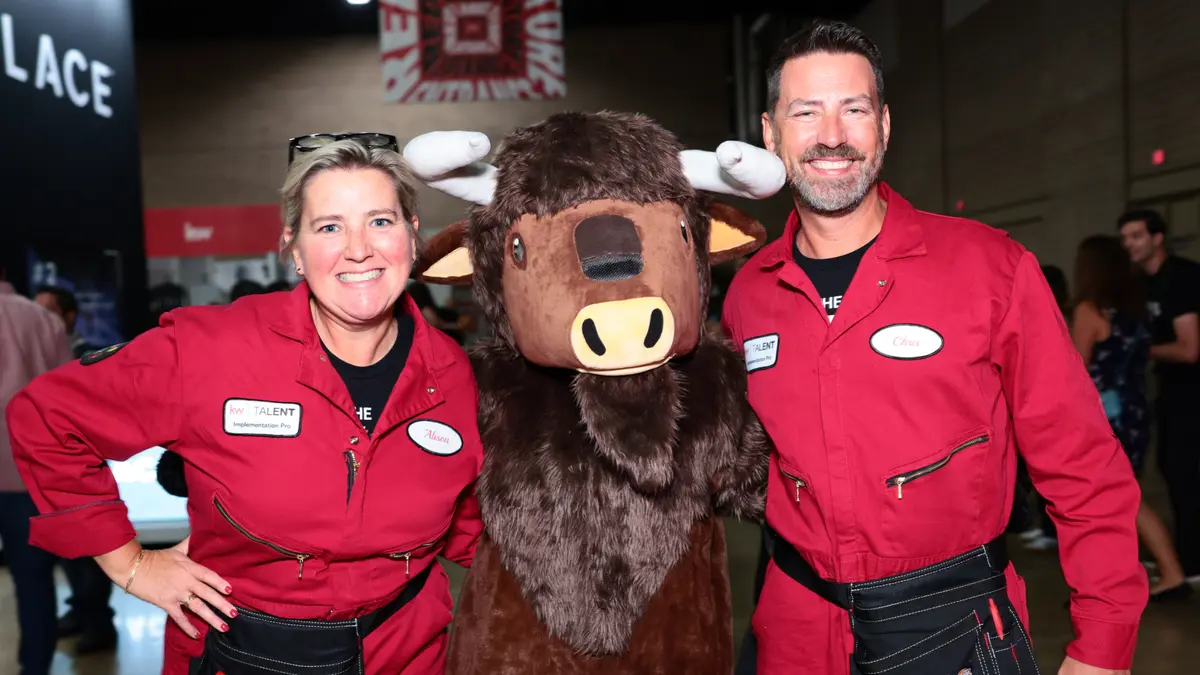 Attendees with Charge, our favorite buffalo, at a past Mega Agent Camp.