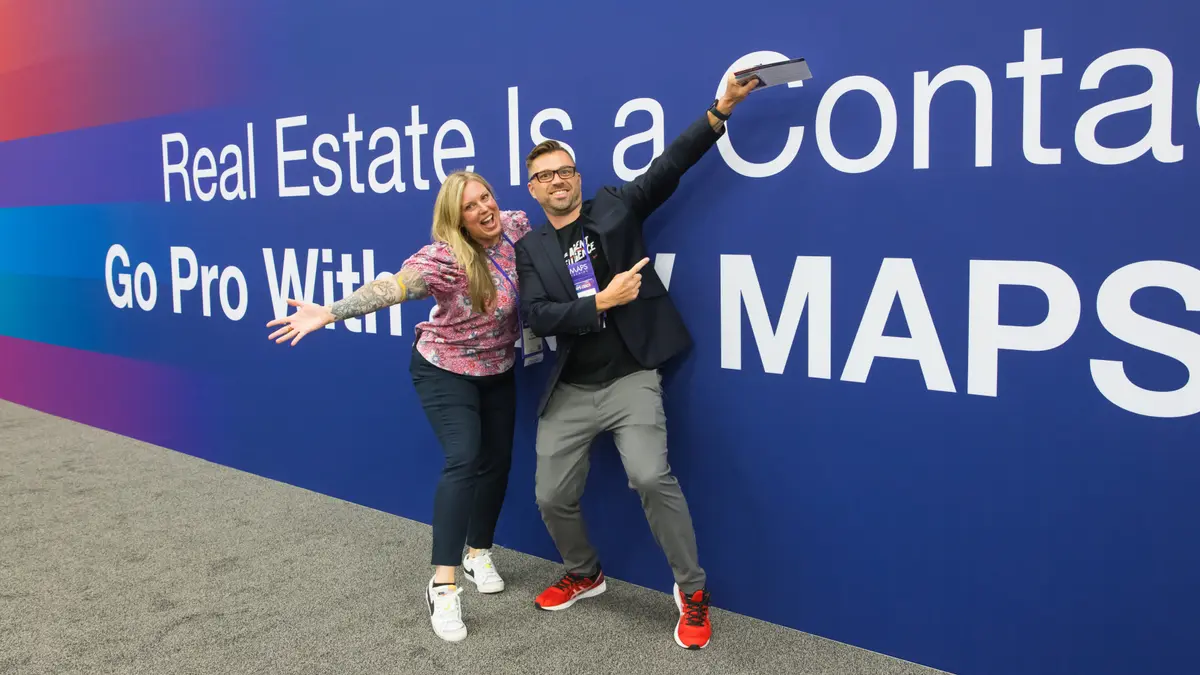 Attendees at the KW MAPS Coaching booth at past Mega Agent Camp.