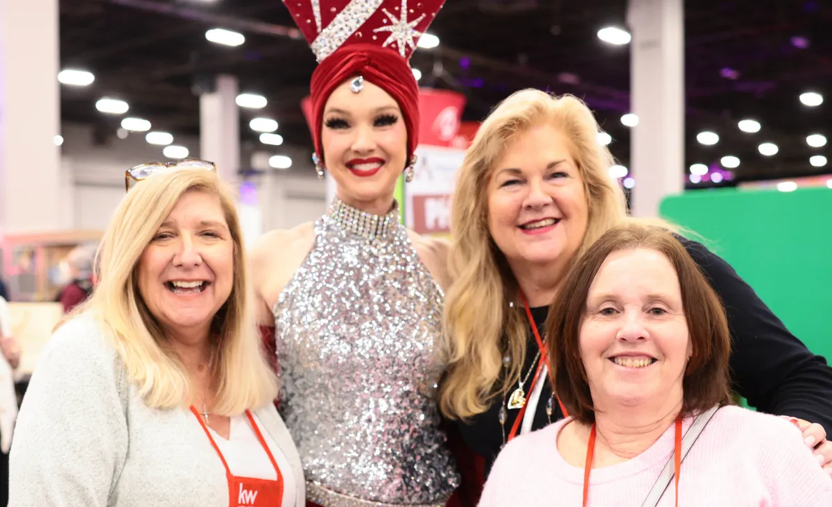 FR attendees getting a photo with a Vegas dancer