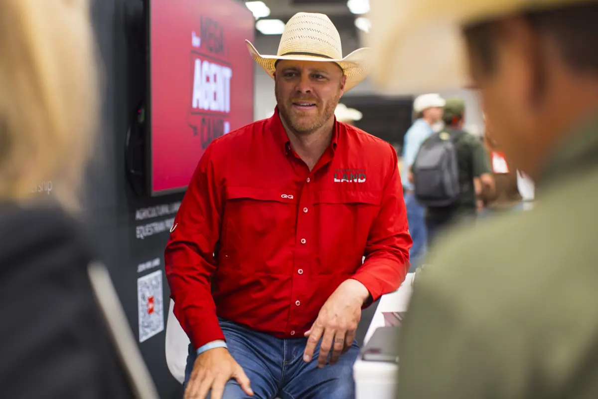 KW Land booth speaking to agents