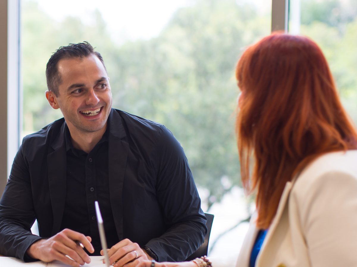 Experienced real estate agent reviewing business strategy