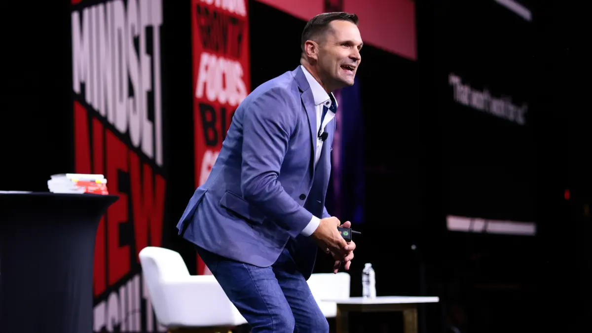 Speaker on stage during past Mega Agent Camp.