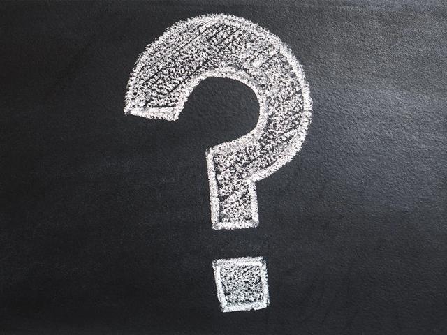 Question mark written on blackboard