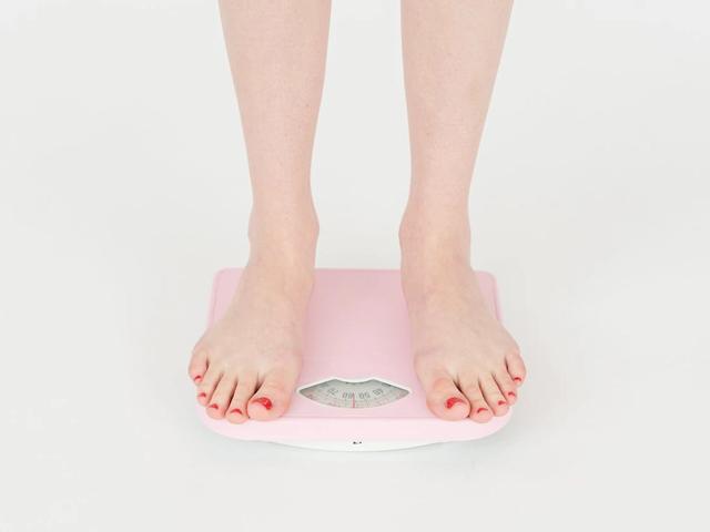 Person standing on a scale