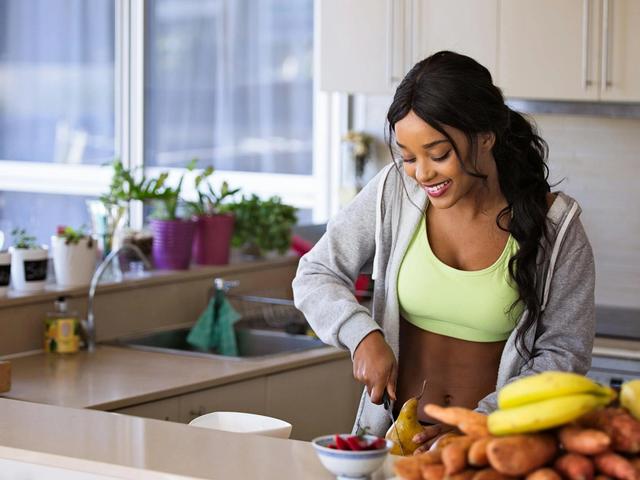 Woman slicing pear