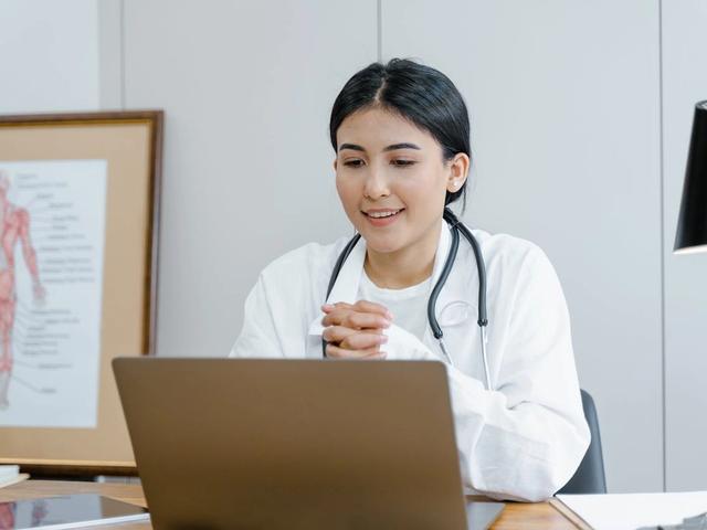 Female doctor doing a video consultation