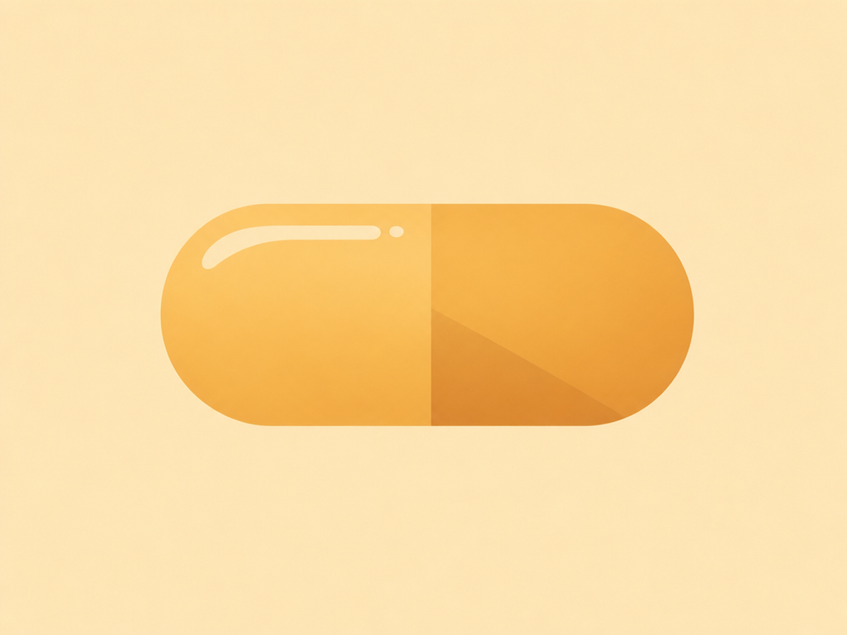 Flat amber illustration of a vitamin capsule, representing vitamins A, B, C, D, E and K