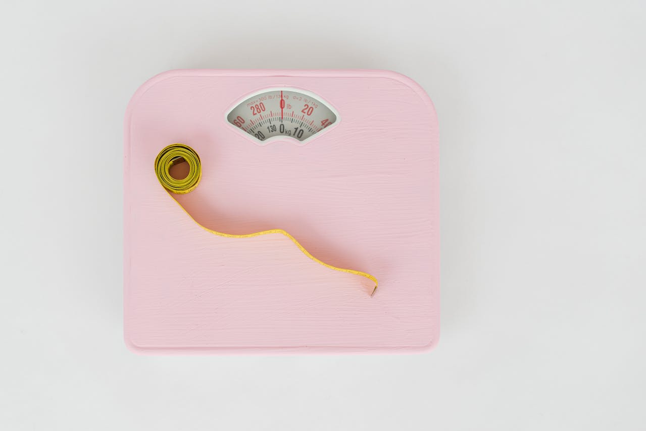 Measuring tape on a weight scale