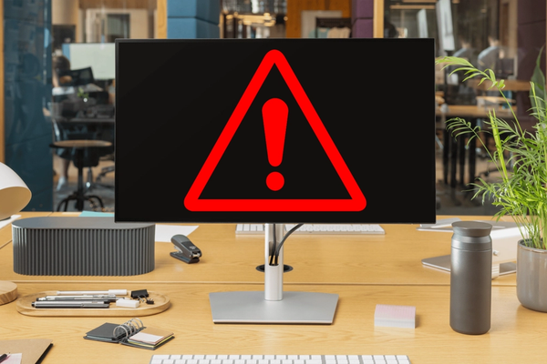 Warning symbol illustration on computer