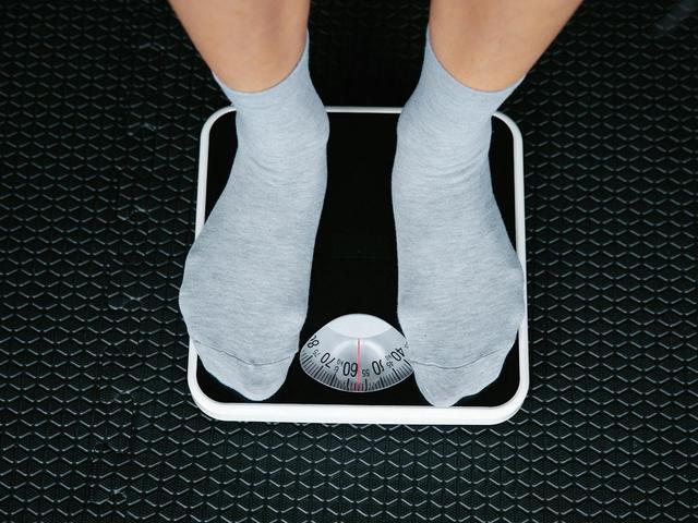 Person standing on scale