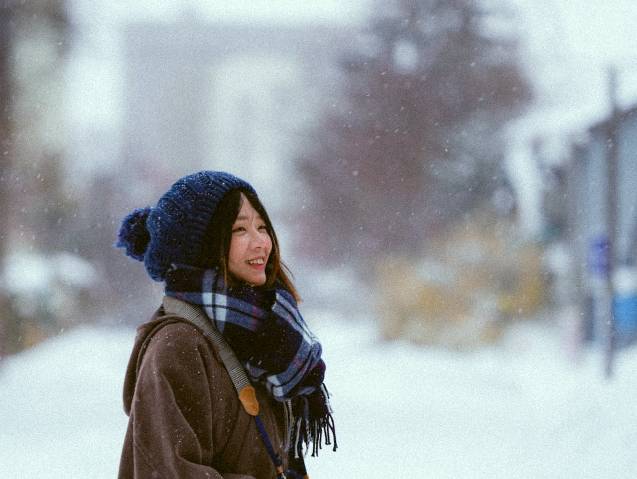 Woman standing in snow