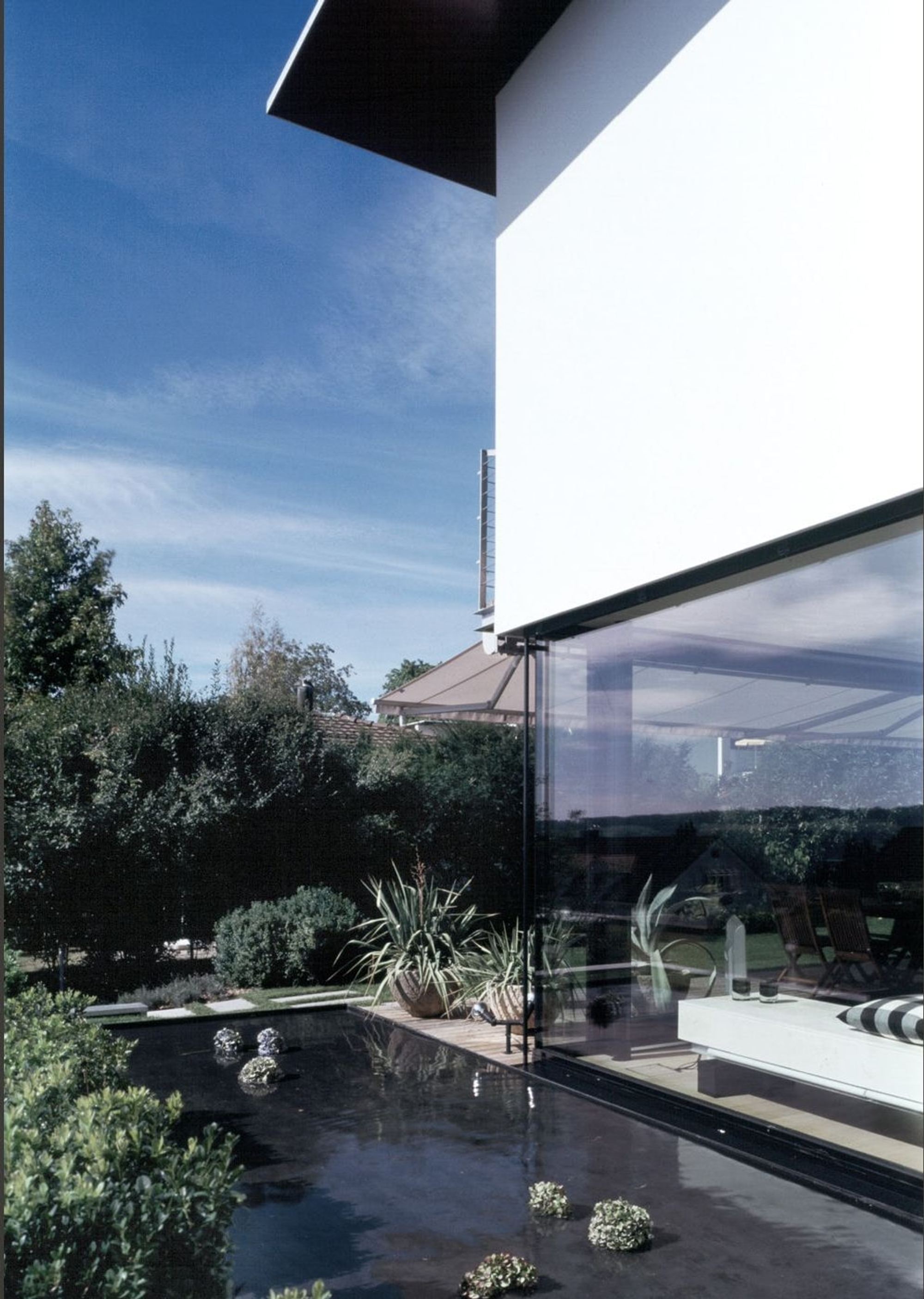 Glazed corner above the water basin – Single-family house in Davos Platz
