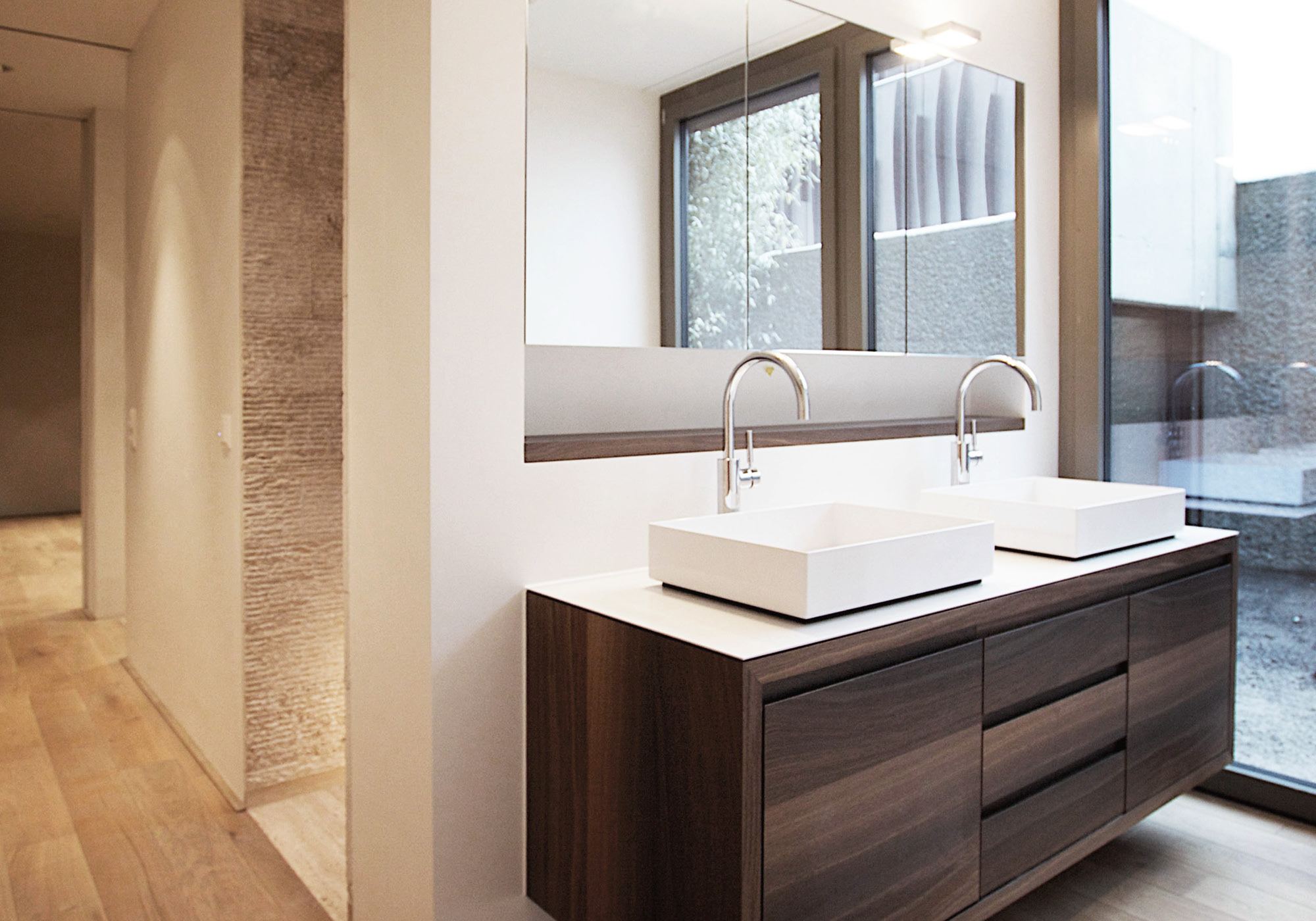 Double vanity with timber base unit – Apartment building in Uitikon