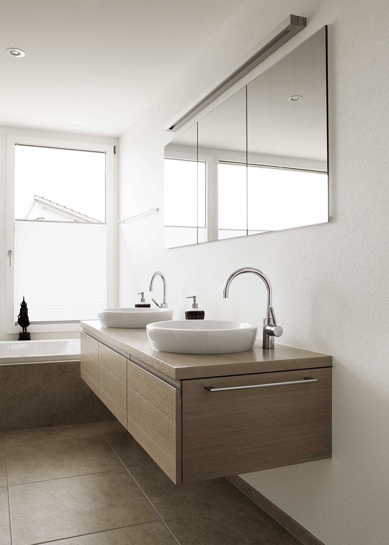 Vanity with mirrored cabinet
