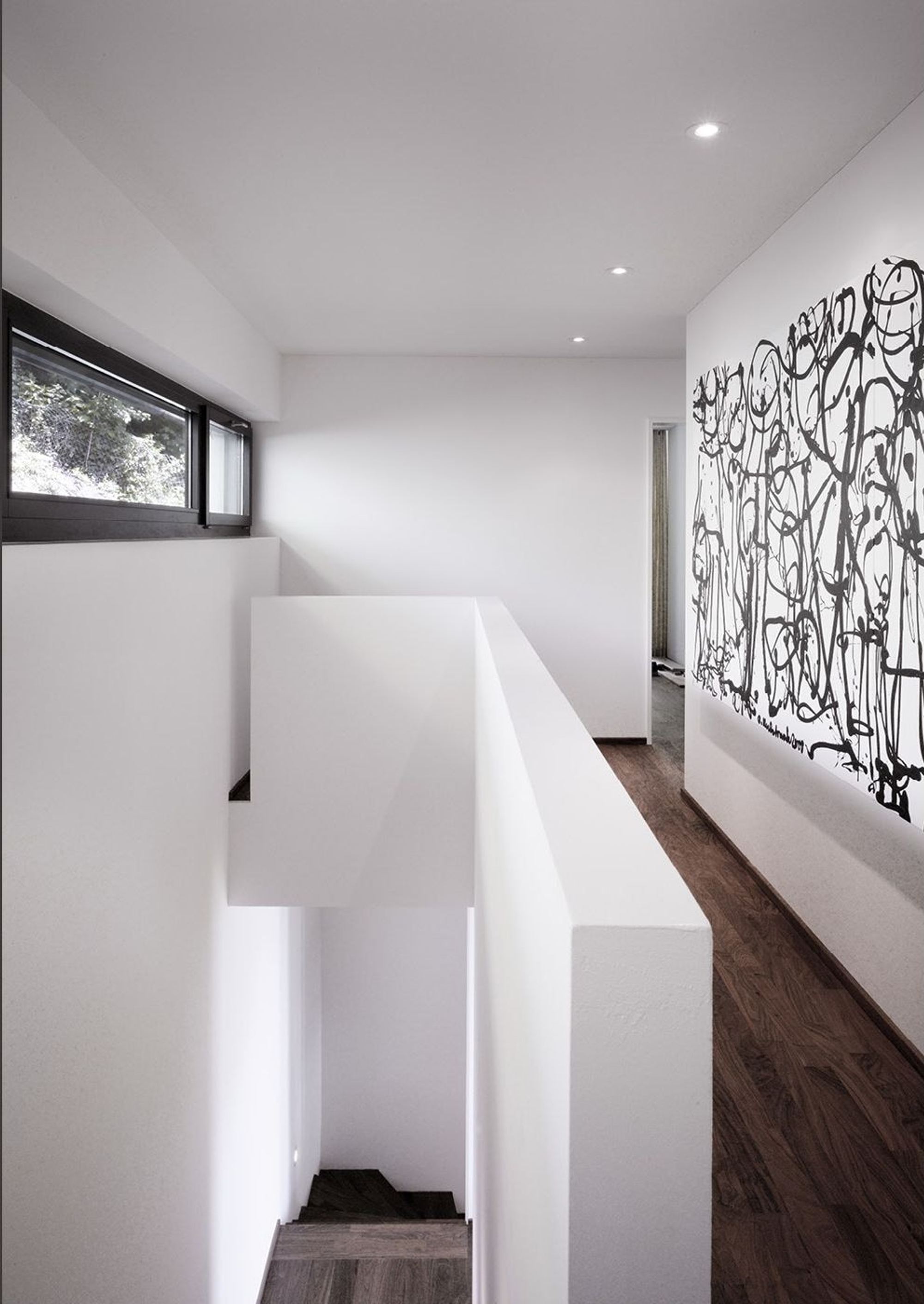 Gallery with large mural – Single-family house in Wettingen