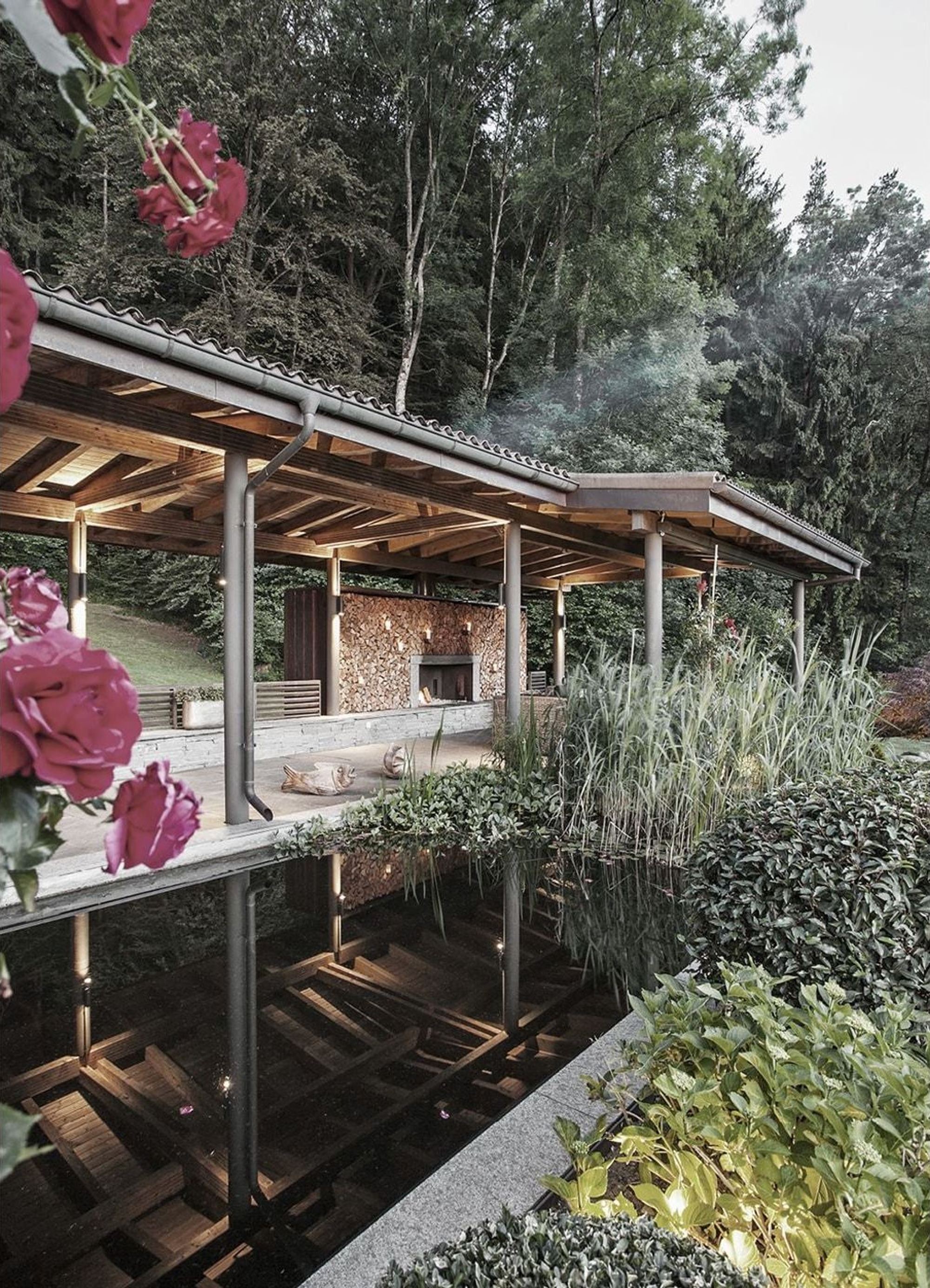 Water basin with roses in front of the covered seating area – Interiors and landscape, Stallikon