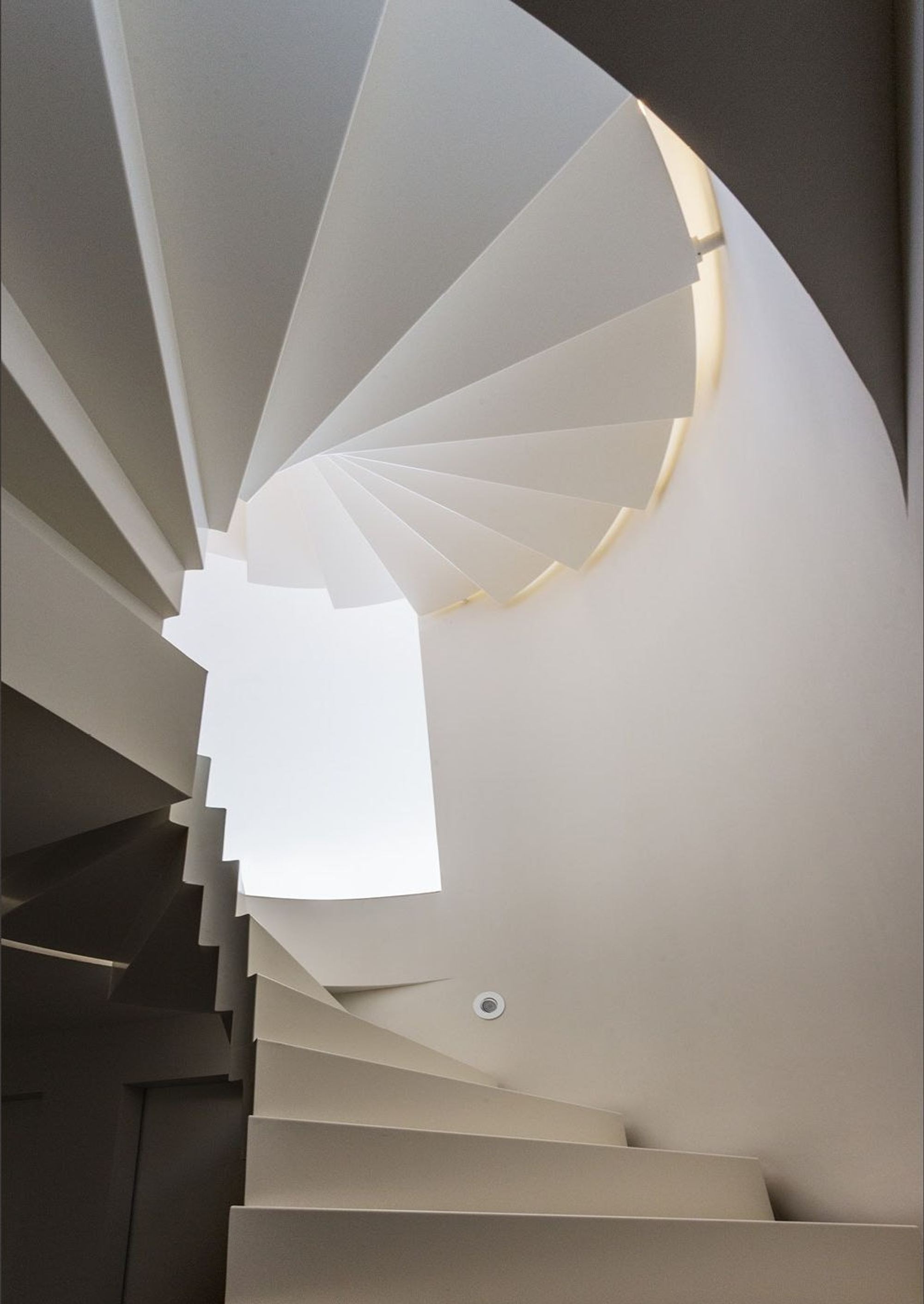 Underside of the white spiral staircase – Interiors and landscape, Herrliberg