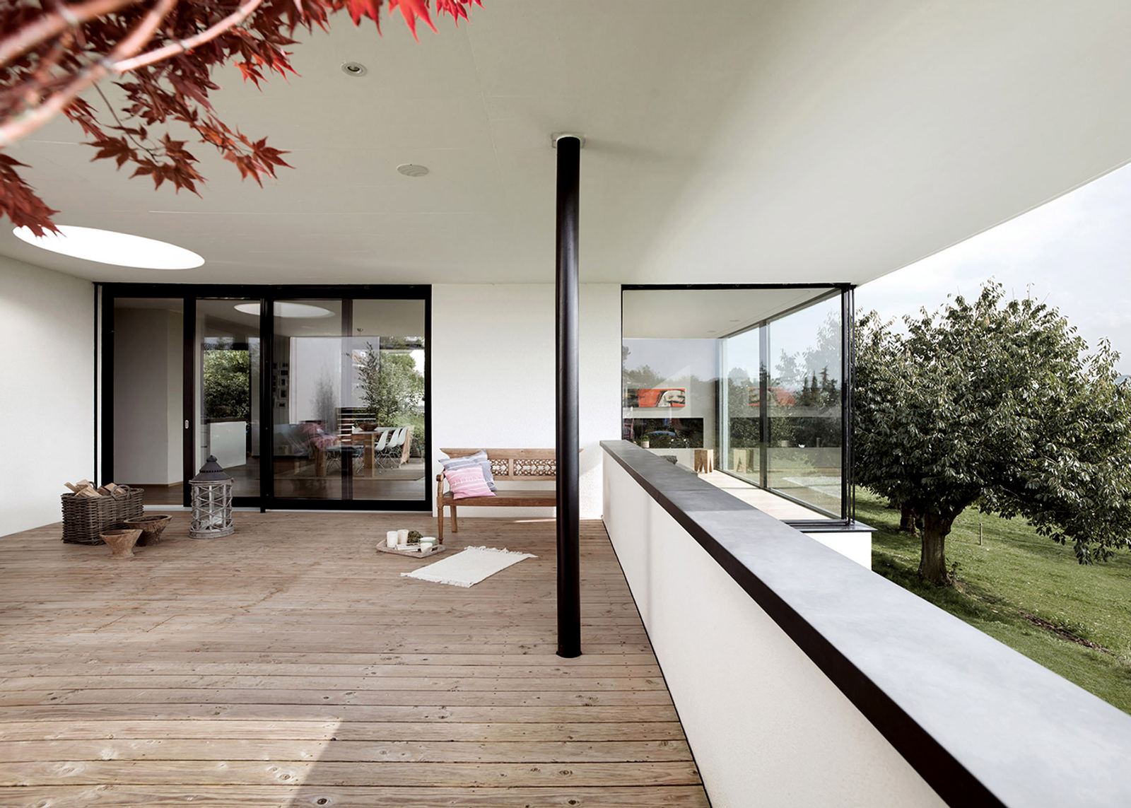 Timber terrace with column and Japanese maple