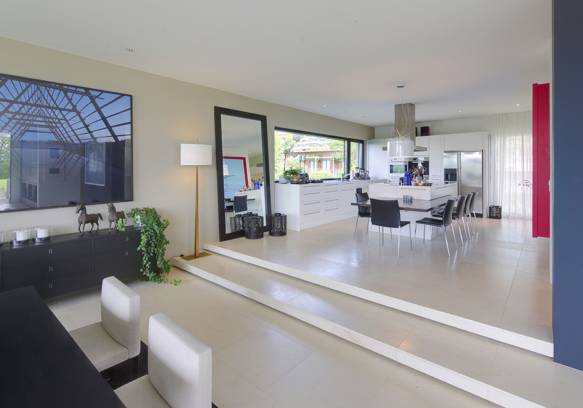 Split-level living space with kitchen behind – Single-family house in Meilen