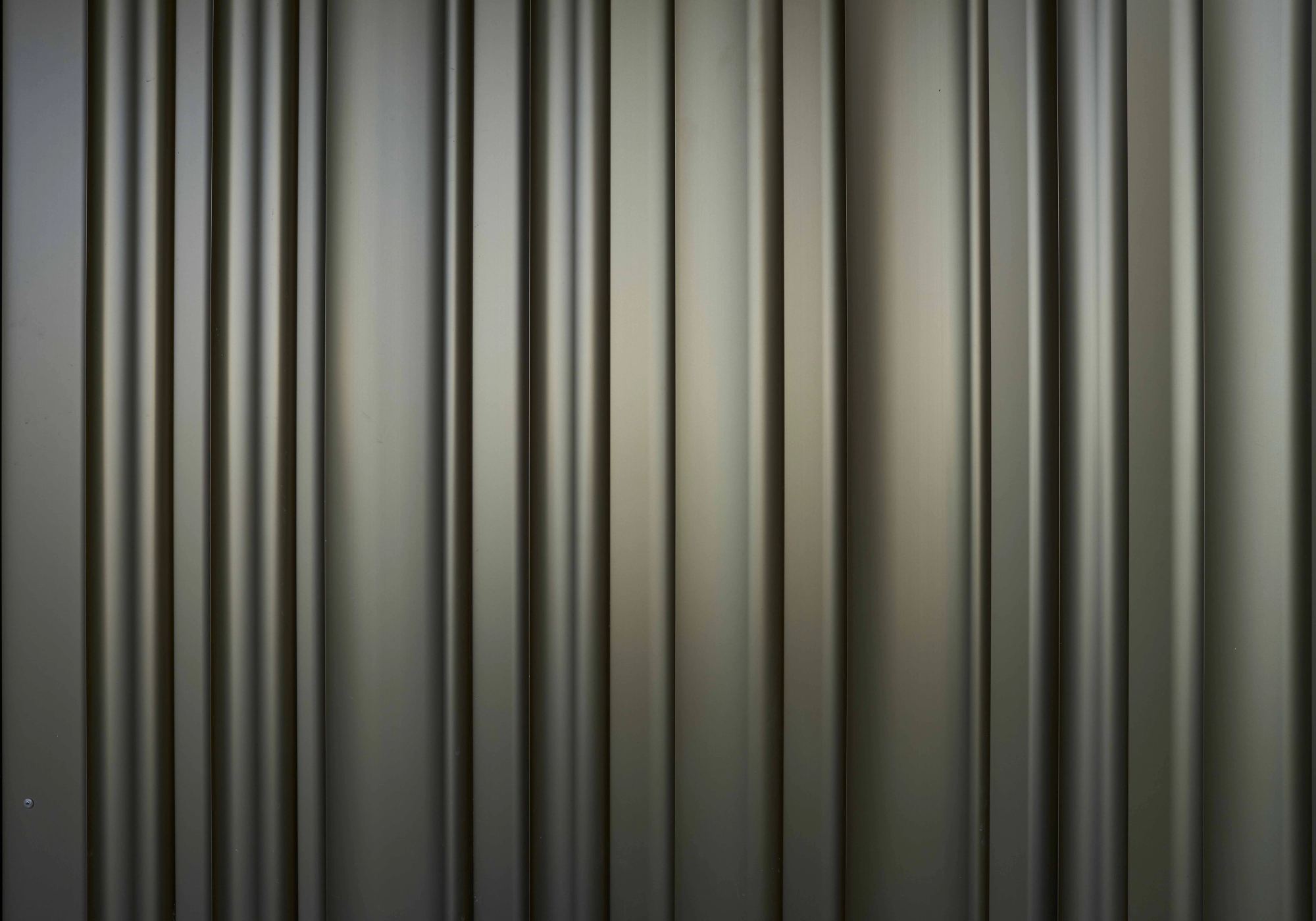 Detail of the ribbed facade cladding – Apartment building
