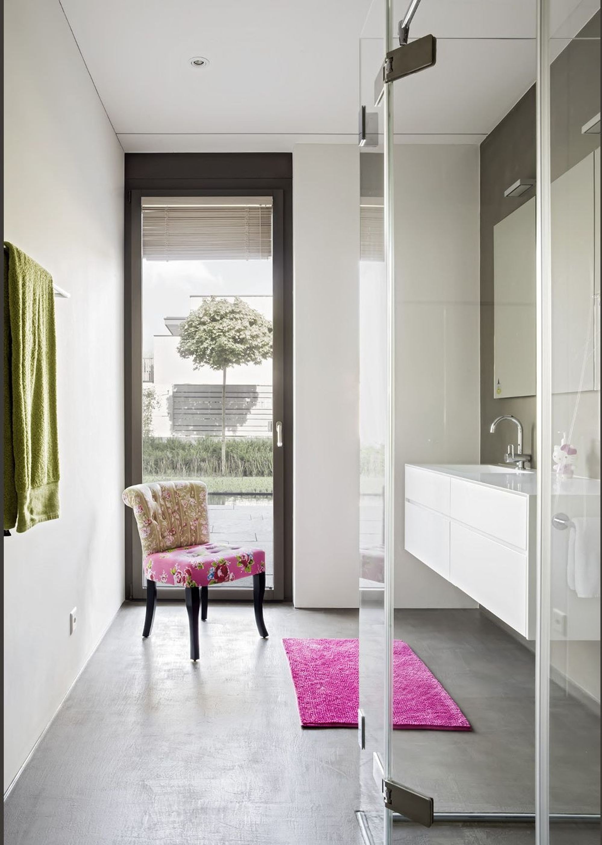 Dressing room with chair and view outside – Single-family house in Schindellegi