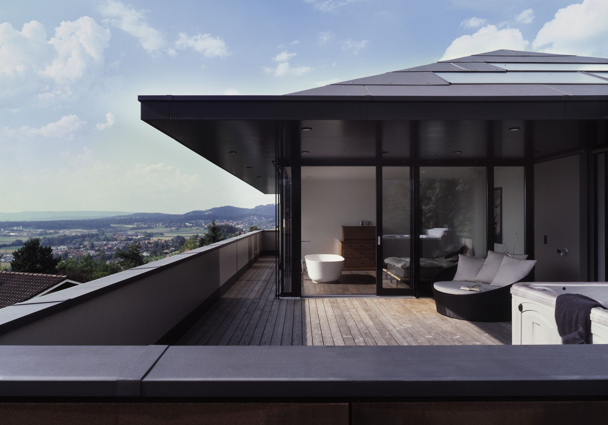 Terrace with timber deck and view over the countryside – Single-family house in Bonstetten