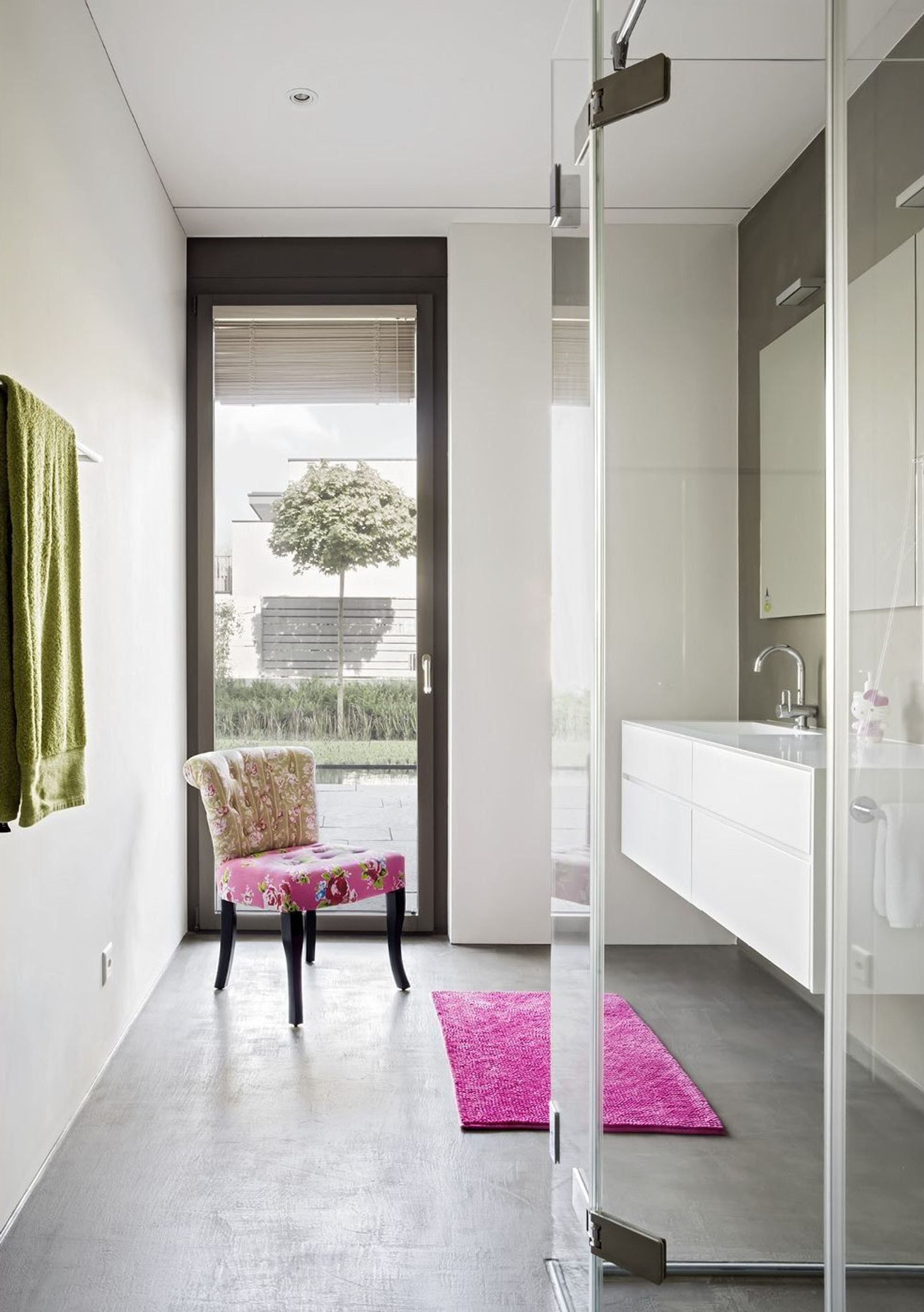 Dressing room with chair and view outside – Single-family house in Schindellegi