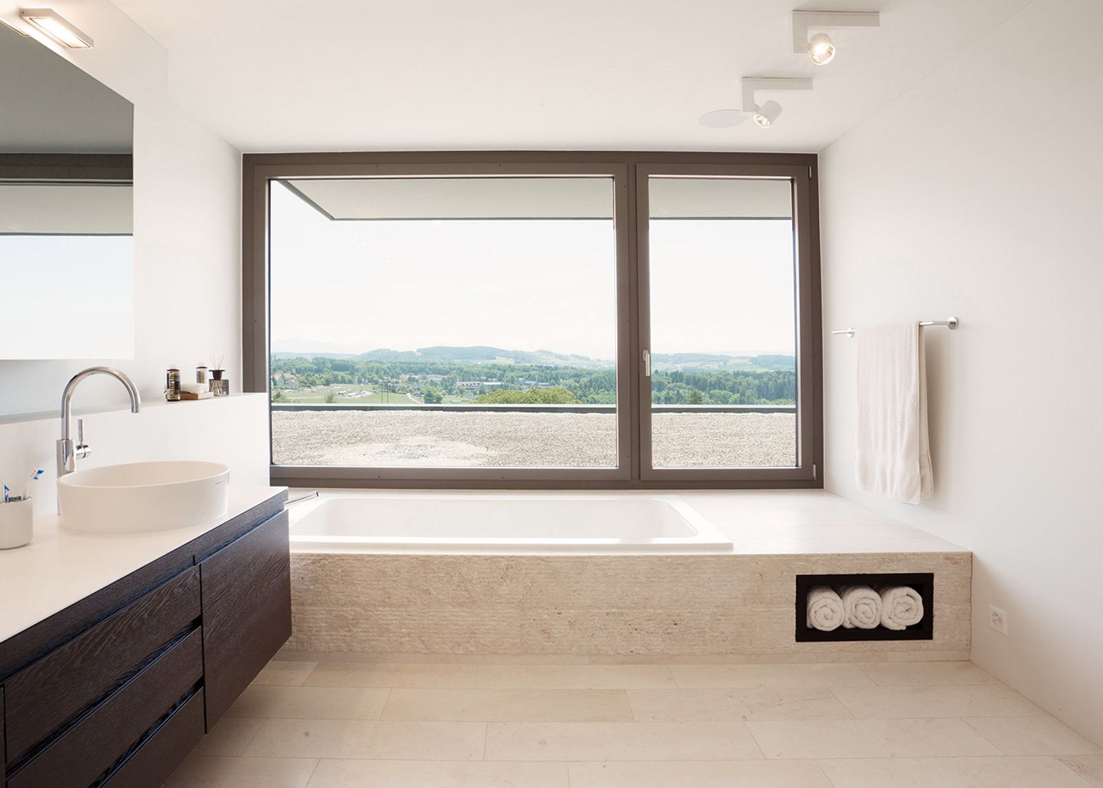 Bathtub below the panoramic window