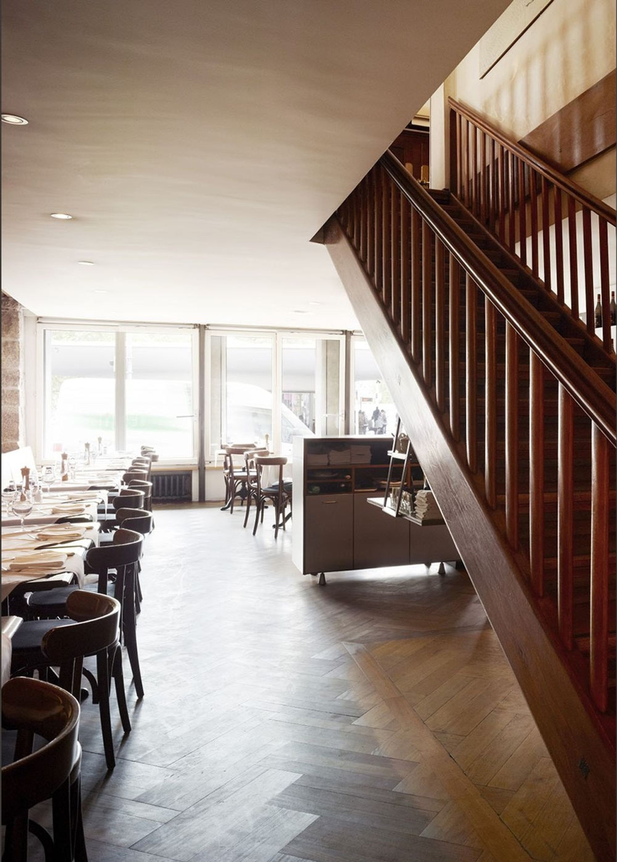 Timber staircase in the restaurant with herringbone parquet – Interiors and landscape, Zürich