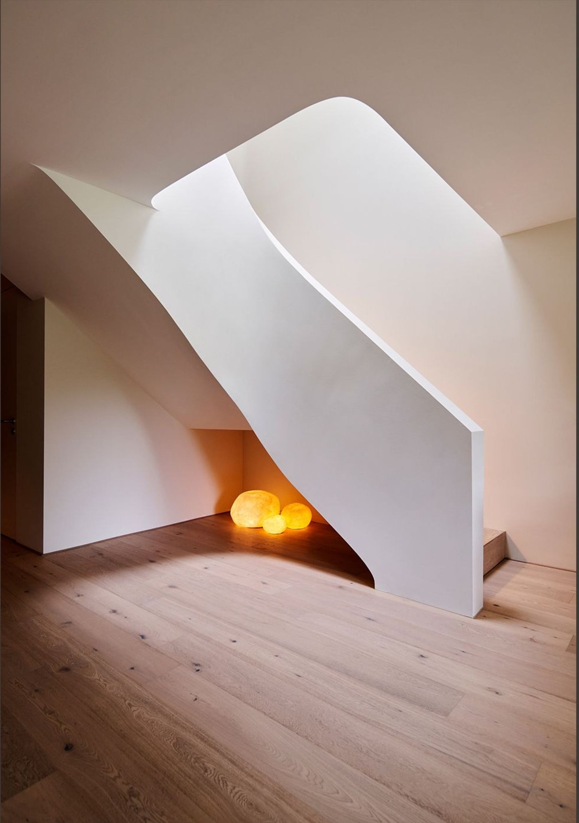 Sculptural white staircase with light object – Interiors and landscape, Wettswil