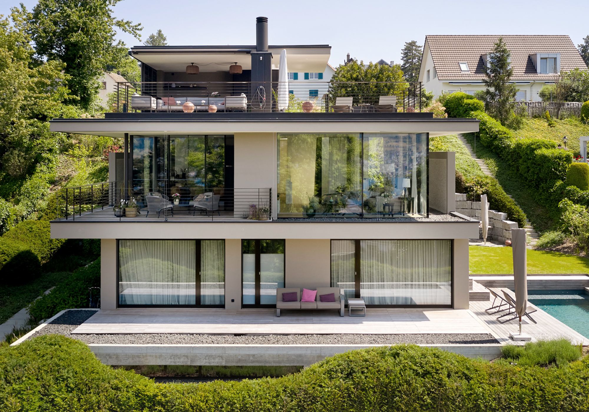 Three-storey garden facade with pool and terraces – Single-family house in Herrliberg