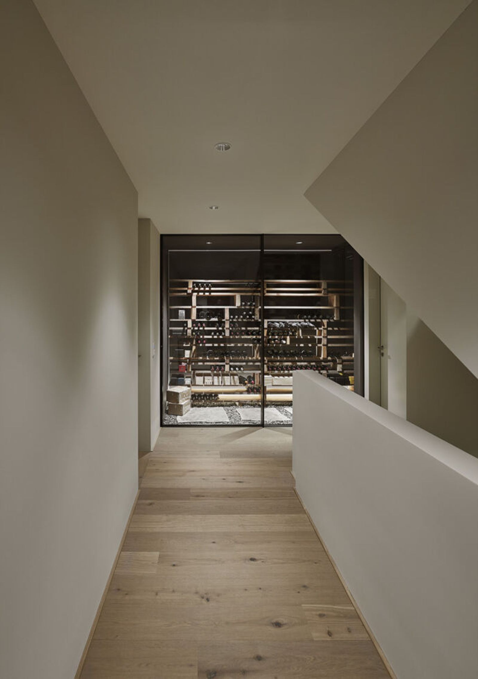 Hallway with view into the glazed wine cellar