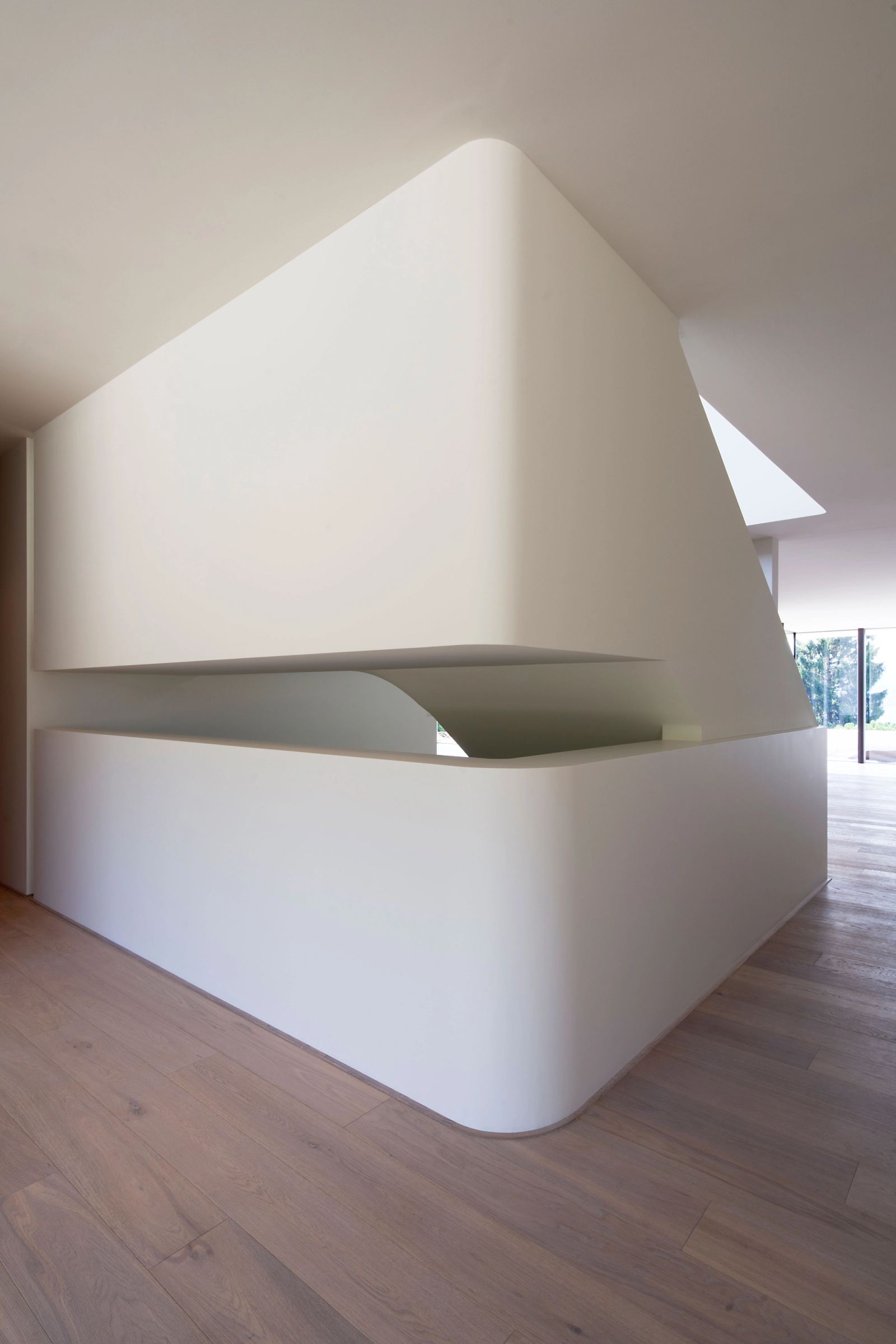 White stair balustrade with rounded edges