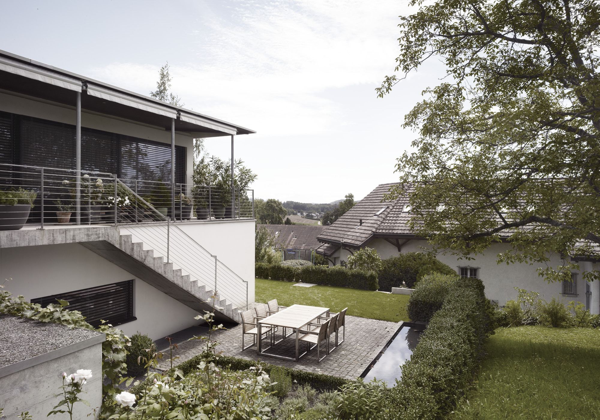 Sunken seating area with water basin – Interiors and landscape, Uitikon