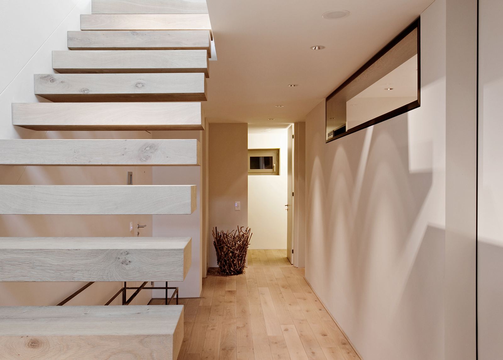 Floating timber steps in the hallway