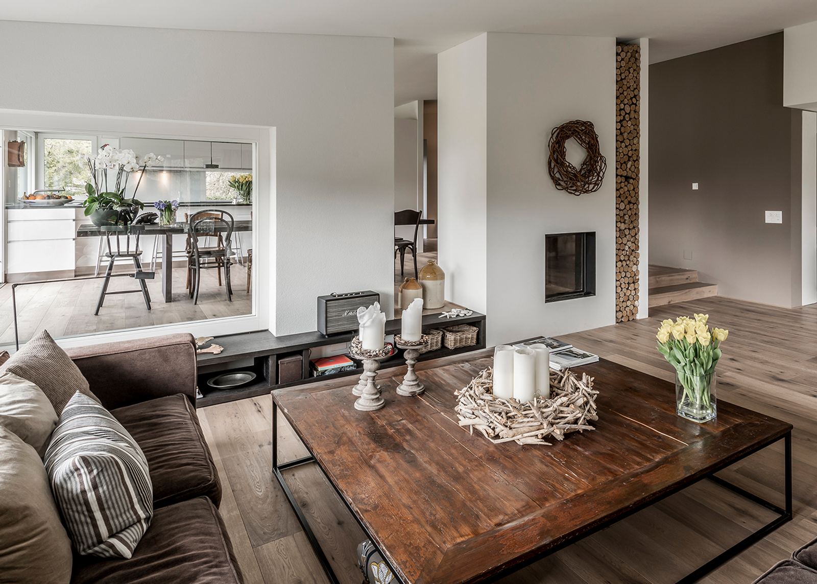 Living room with timber table and fireplace